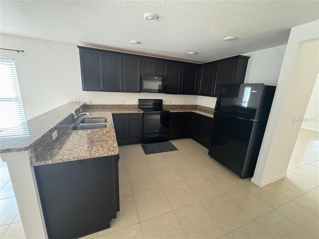 Building Photo - 6909 Crested Orchid Dr