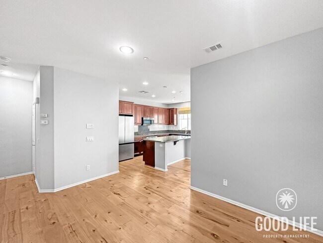 Building Photo - Elegant 3BR Residence in Exclusive Gated Community w/ AC & Garage!