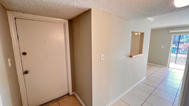 Building Photo - AVAILABLE NOW! Gorgeous 2/1 Condo located ...