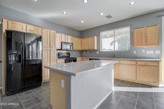 Building Photo - 11841 W Planada Ct