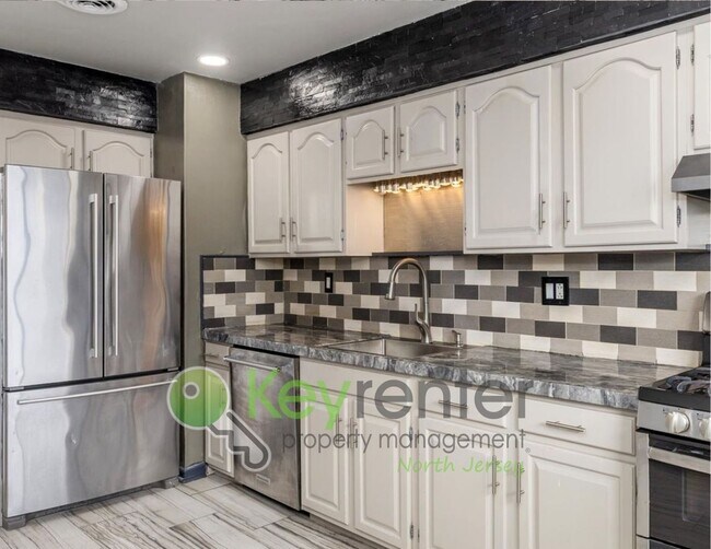 Foto del edificio - Modern 3-Level Townhome with River Views in Wallington