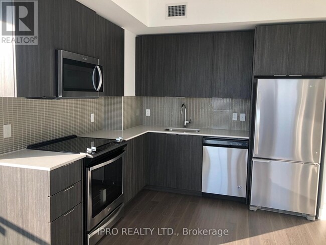 Building Photo - 20-3820 Shore Breeze Dr