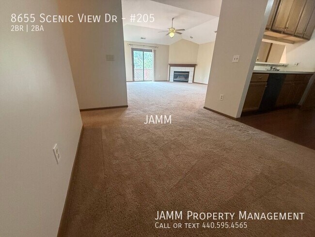 Building Photo - 8655 Scenic View Dr-#205
