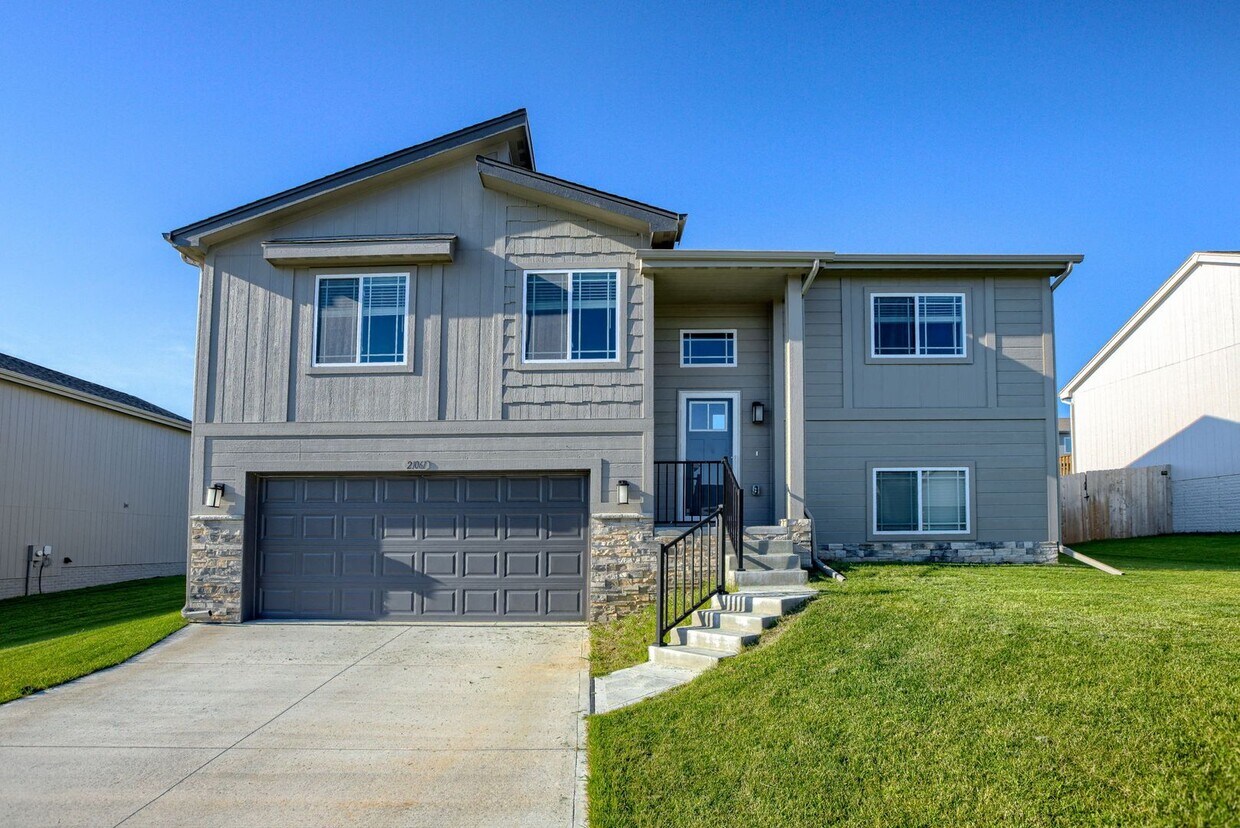 Primary Photo - Newer Home with Style & Space in Growing S...