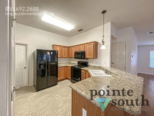 Foto del edificio - 9841 Watkins Dr