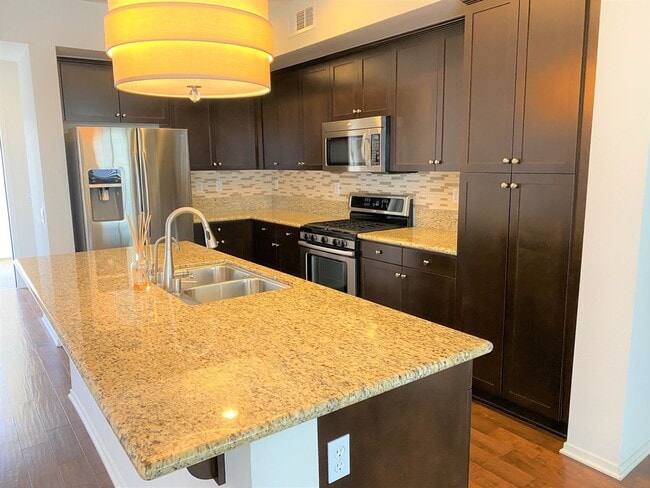 Building Photo - Executive 2-Bedroom Condo in the Prestigious South Bay 360 Community
