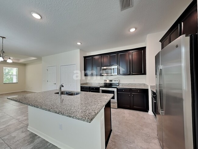 Building Photo - 8634 Firefly Pl
