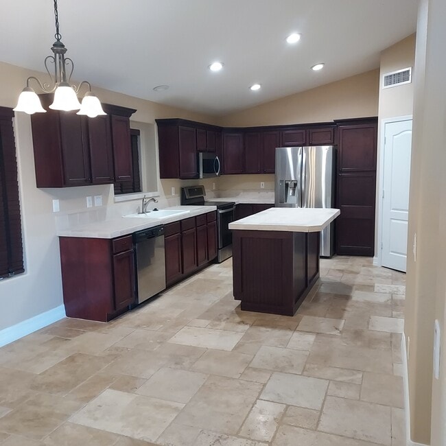 Building Photo - 9447 E Olla Ave