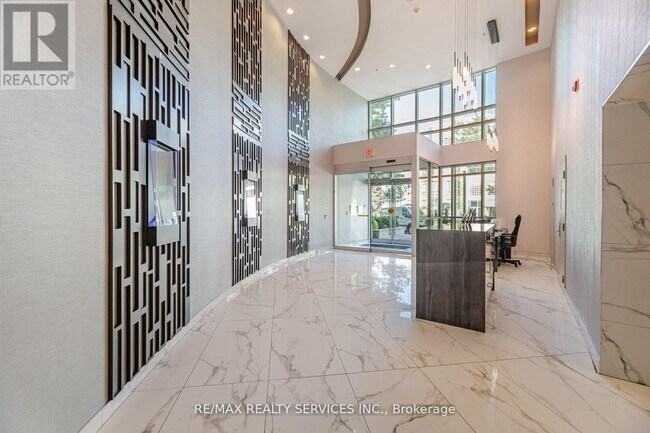 Photo du bâtiment - 80 Absolute Ave