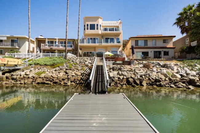 Personal boat dock with waterfront patio and private deck - 4667 Park Dr