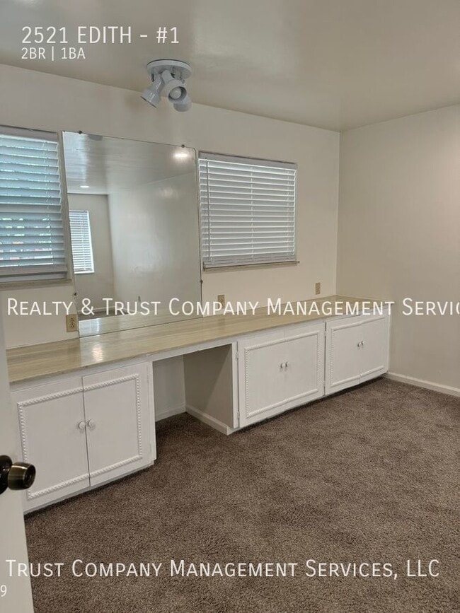Building Photo - Welcome to our charming 2-bedroom, 1-bathr...