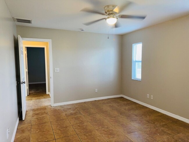 Building Photo - Experience this Cape Coral 3 bedroom 2 bath corner duplex with 1 car garage and screened in lanai.