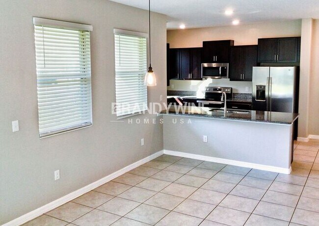 Building Photo - MOVE IN SPECIAL - BELMONT TOWNHOMES - AUGU...