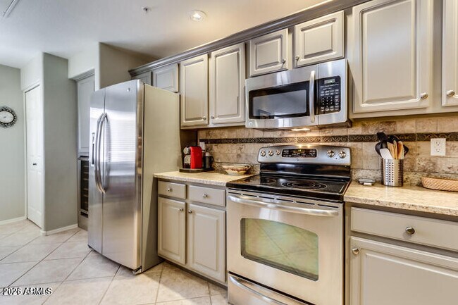 Building Photo - 9455 E Raintree Dr