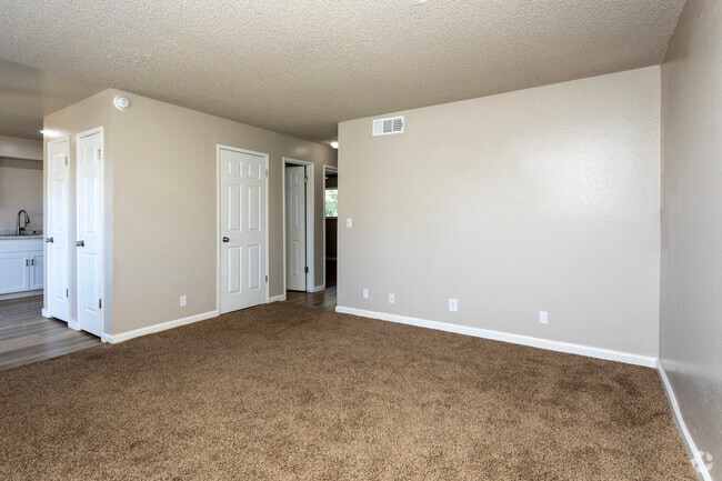2BR, 1BA - 840SF - Living Room - Cedar Apartments