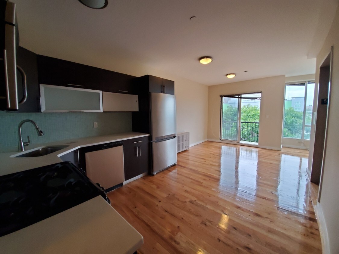 newly renovated kitchen and living roo - 211 61st St