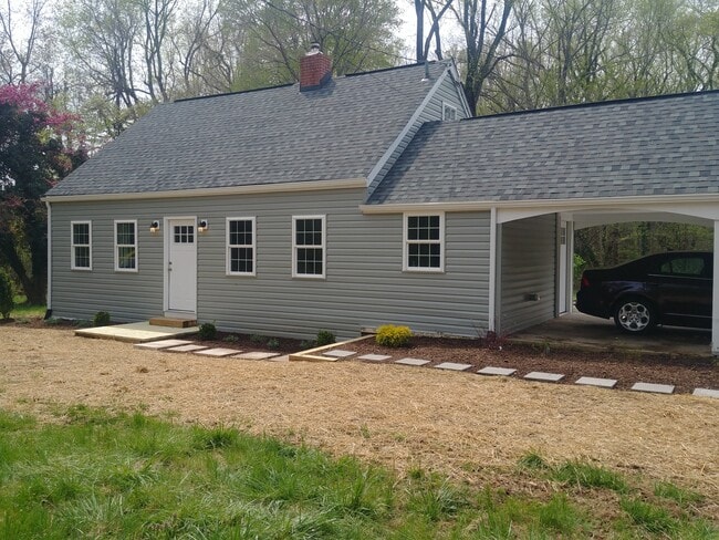 Newly landscaped front yard. - 16201 Marlboro Pike