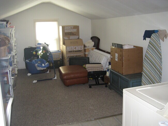 An easily accessed bonus room can be used for storage, an office, crafting...etc. - 602 Creekvalley Rd. House