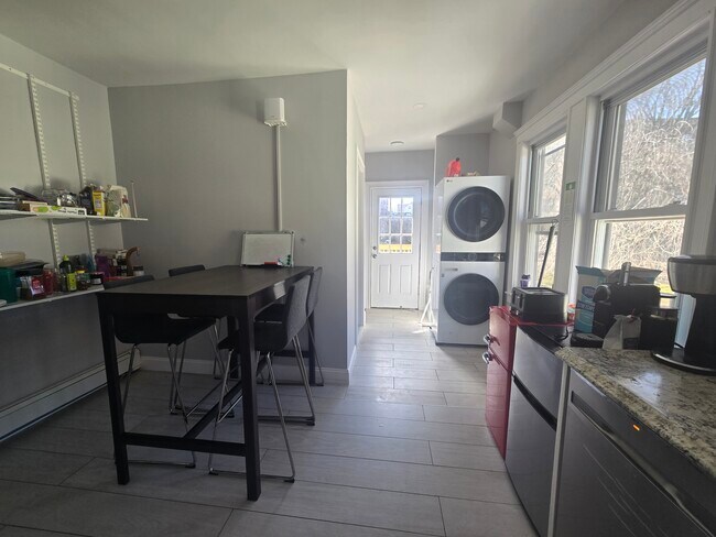 in unit washer-dryer and dining area - 81 Bow St