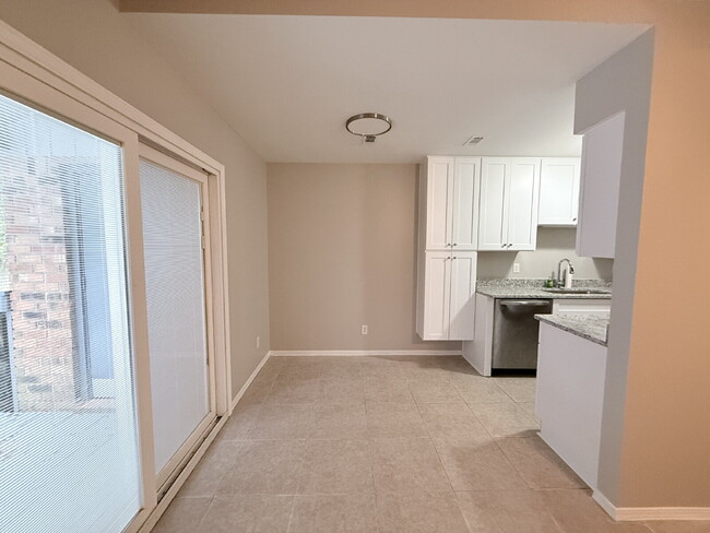 Building Photo - Charming 2-Bed, 2-Bath Condo with Granite Finishes Ready for Move In.
