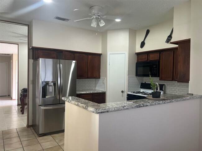 Foto del edificio - 10907 Spring Harvest Dr