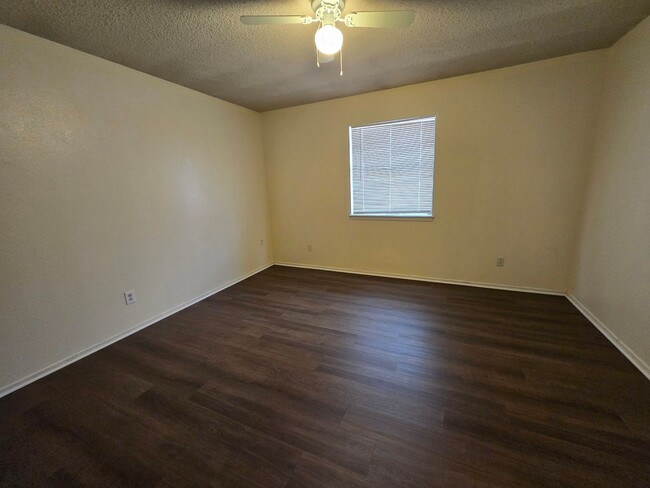 Building Photo - New paint and flooring throughout!