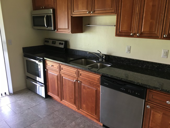 Kitchen area - Oasis Apartments