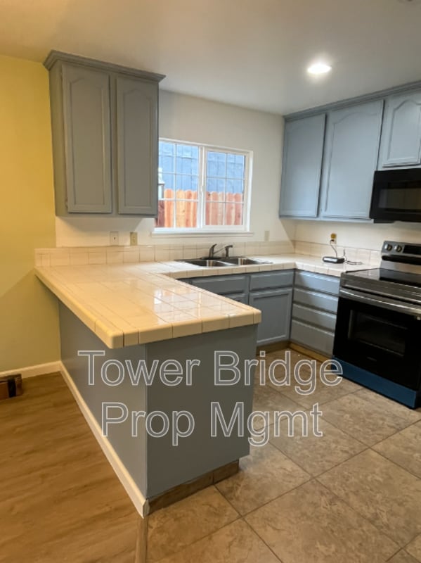 Building Photo - 8676 Tiogawoods Dr