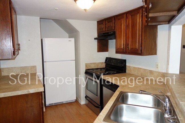 Building Photo - 1 BR condominium community with secured, a...