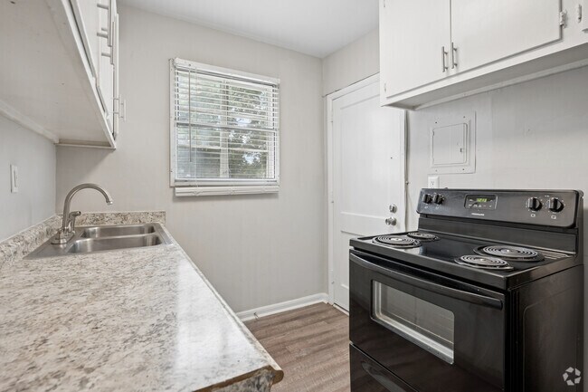 2 habitaciones, 1 baño - 1100 pies cuadrados - Cocina - The Oaks at Anderson Apartments