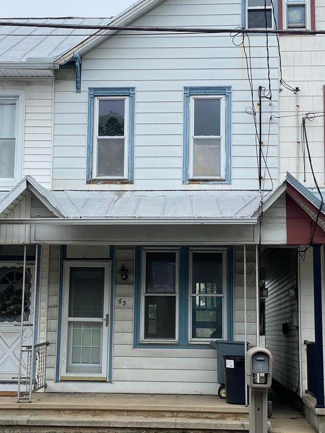 Primary Photo - Single family semi-detached home