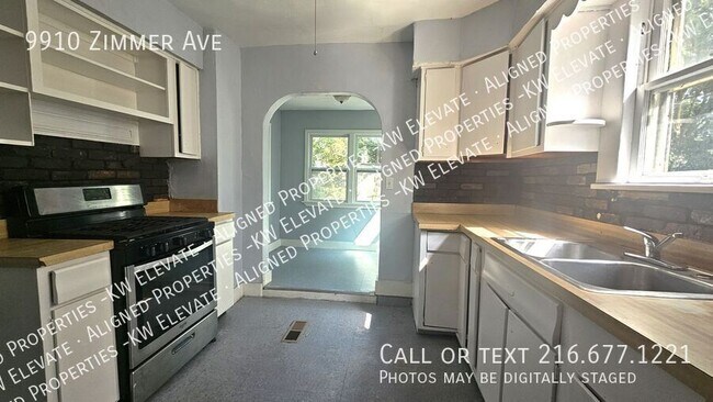 Foto del edificio - 9910 Zimmer Ave