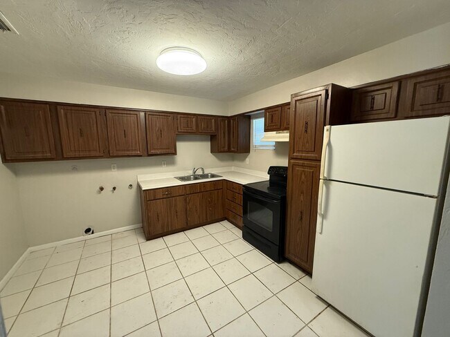 Foto del edificio - Cute 3/1 with Fenced Yard!