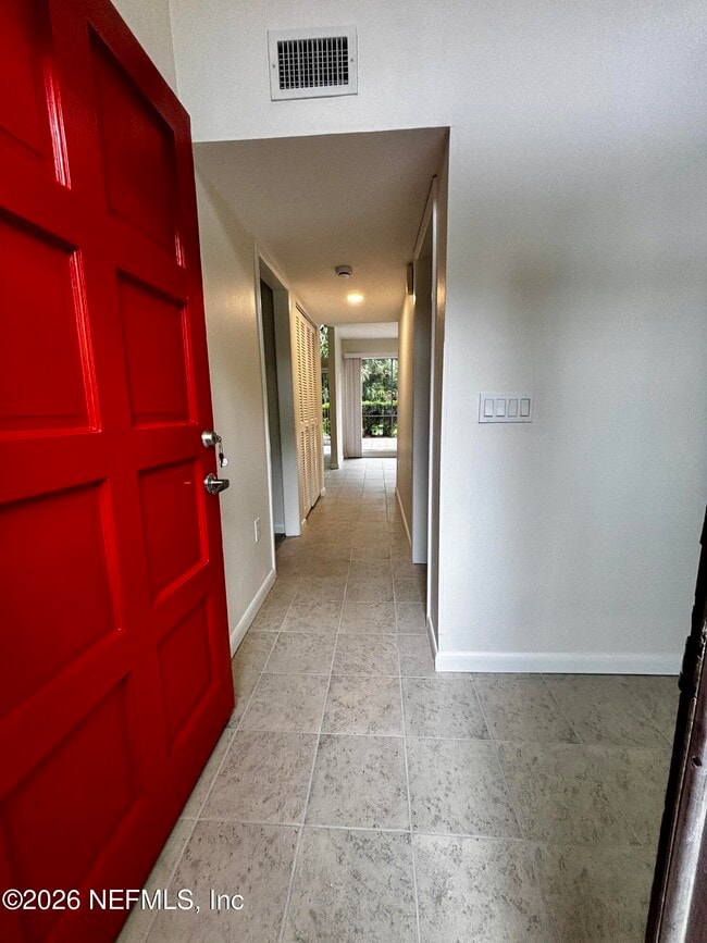 Building Photo - 9787 Sawgrass Dr E