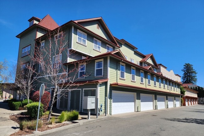 Building Photo - Pet-Friendly Town Green Condo with EV Charger