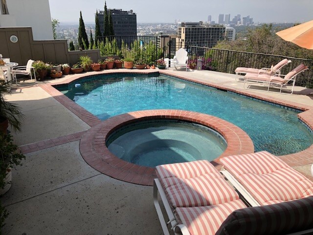 Solar heated pool overlooks city - 8950 St Ives Dr