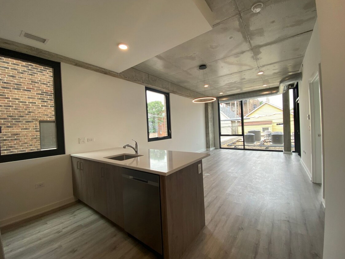 Open Concept Living/Dining Space - 1118 W Patterson Ave