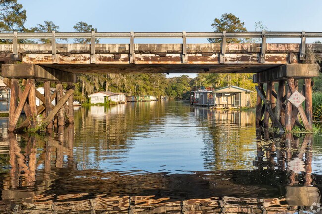 The bayou and boat homes provide a unique and scenic landscape in the Choctaw area.