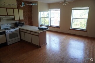 Building Photo - 1255 W Devon Ave