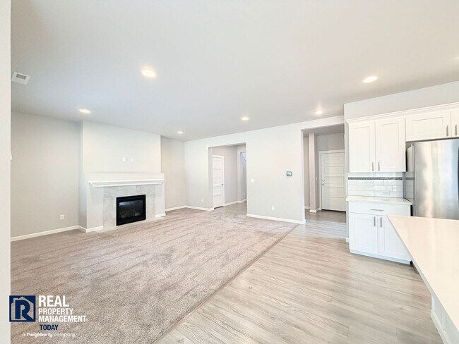 Building Photo - Easy JBLM Commute Like-New 4BR Home with 3-Car Garage & Bonus Office