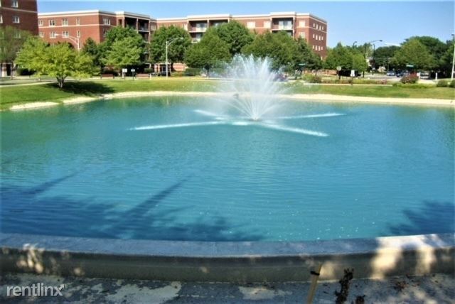Building Photo - 1 br, 1 bath Condo - 6461 W Warner Ave Apt...
