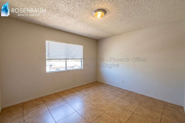 Building Photo - 6440 E Alder Ave