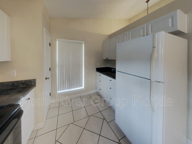 Building Photo - 7077 Weatherwood Dr