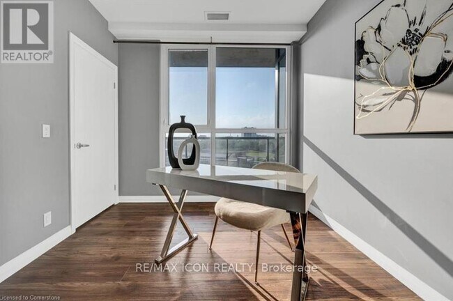 Photo du bâtiment - 104-1104 Garment St