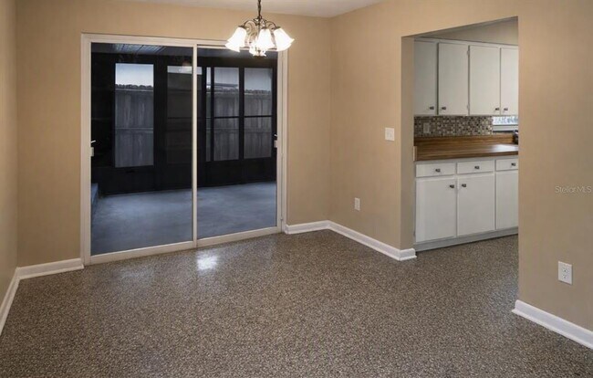 Building Photo - 8021 N Ola Ave