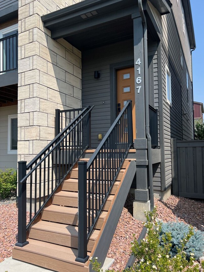 Building Photo - Impressive 4 Bedroom Townhome Nestled in M...