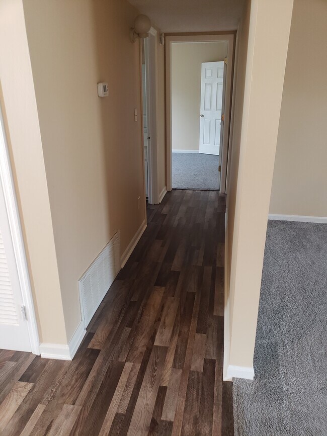 Hallway new floor and new paint. - 3212 Spring Hollow Ave