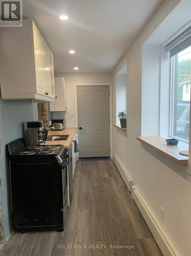 Photo du bâtiment - 71 King St E