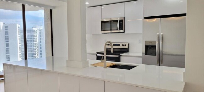 Photo - 19355 Turnberry Way Apartment