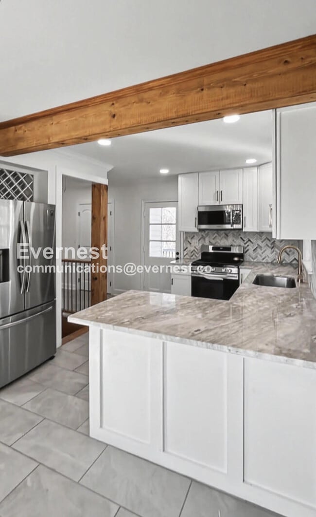 Photo - 3 Bed, 2 Bath Home with Fenced Yard / Pet-Friendly / Available Now!